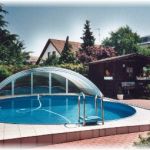 Achtformbecken mit schiebbarer Überdachung